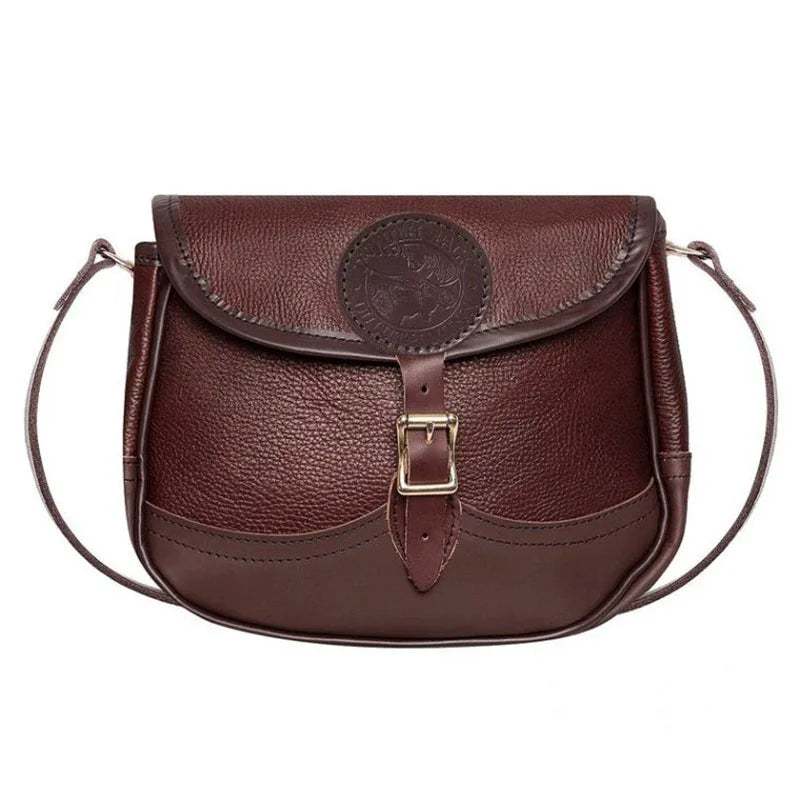Medium Leather Shell Purse in rich brown premium leather with adjustable strap and antique brass buckle, crafted by Duluth Pack for durable outdoor use.