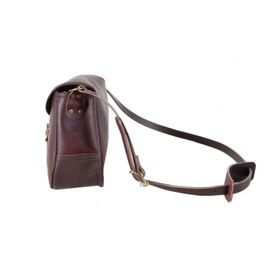 Medium Leather Shell Purse in rich brown premium leather with adjustable strap, showcasing durable craftsmanship by Duluth Pack for outdoor and everyday use.