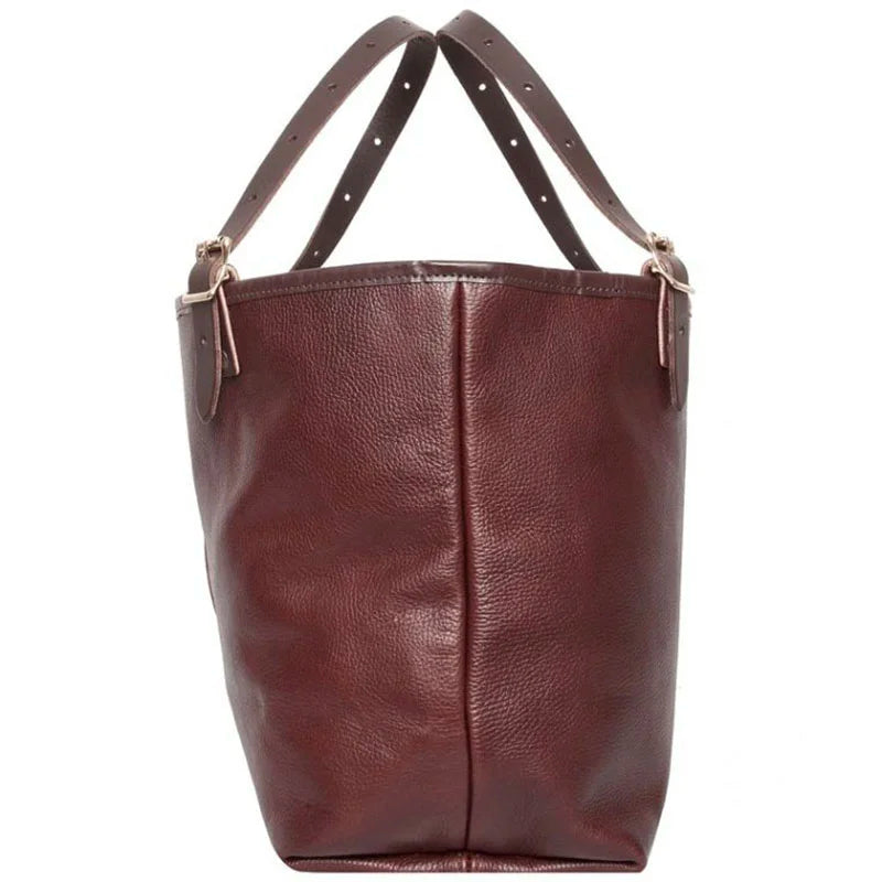 Leather Market Tote in premium USA leather with adjustable leather handles, designed for durable everyday use and versatile outdoor performance.