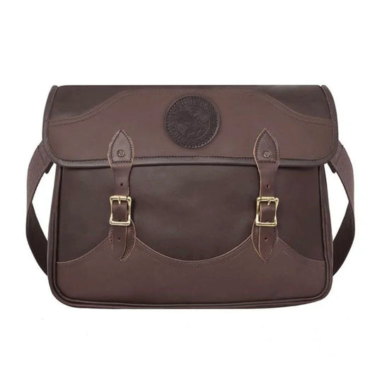 Leather Book Bag in rich brown premium leather with hand-cut construction and adjustable cotton web shoulder strap, designed for rugged, lasting use by Duluth Pack.