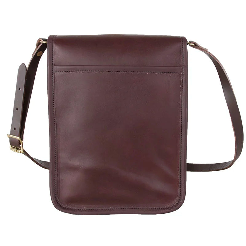 Leather Haversack in rich brown premium leather with adjustable strap, showcasing durable craftsmanship ideal for outdoor use and everyday carry by Duluth Pack.