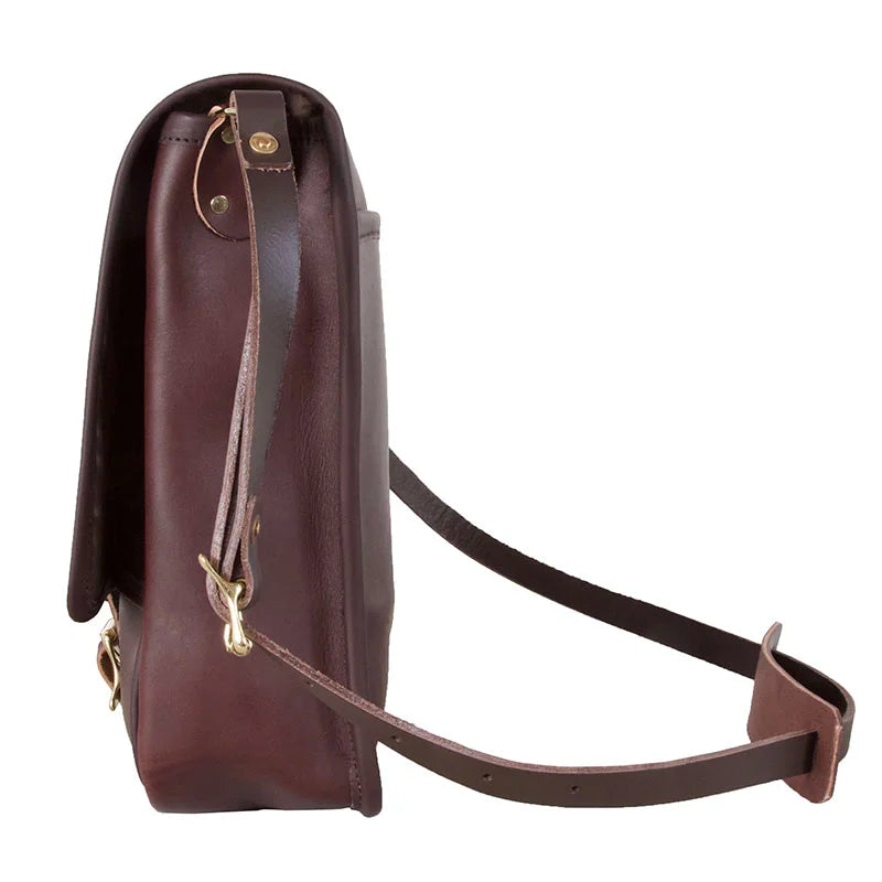 Leather Haversack crafted from thick premium leather with adjustable strap and buckling closure, designed for durable outdoor use by Duluth Pack.