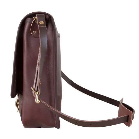 Leather Haversack crafted from thick premium leather with adjustable strap and buckling closure, designed for durable outdoor use by Duluth Pack.