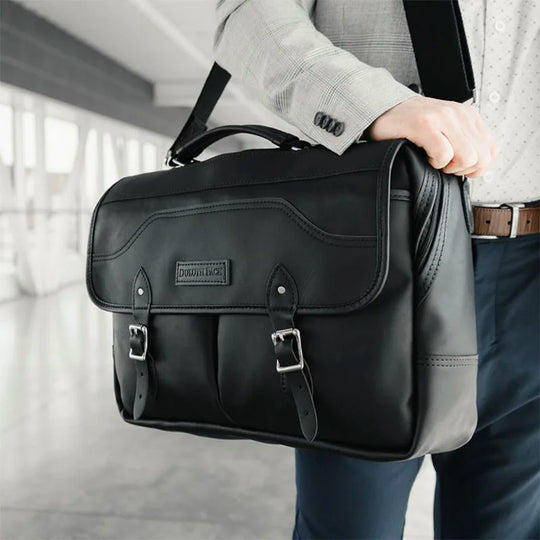 Superior Series Leather Entrepreneur Briefcase on Man with Hand on Bag