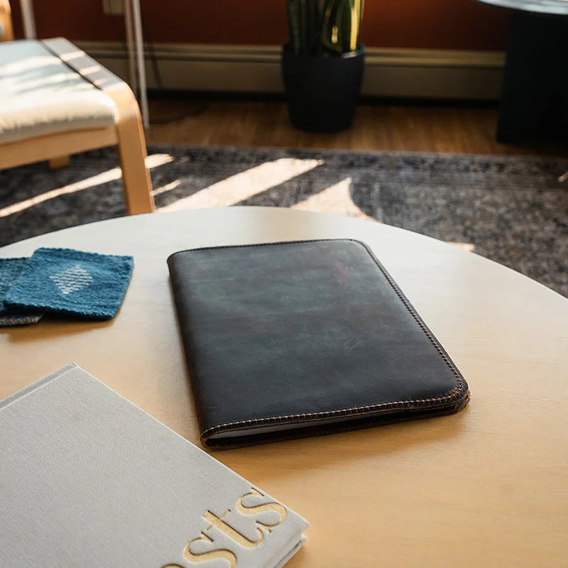 Large Heritage Leather Field Journal on a table in a living 