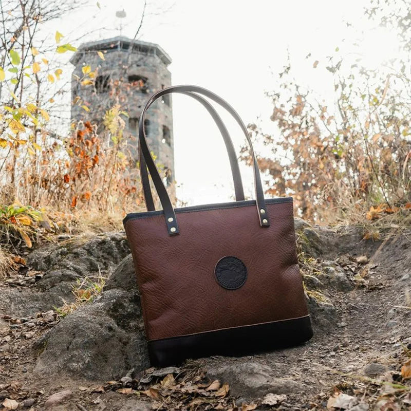 Bison Leather Lakewalk Tote on Trail with Tower in Background
