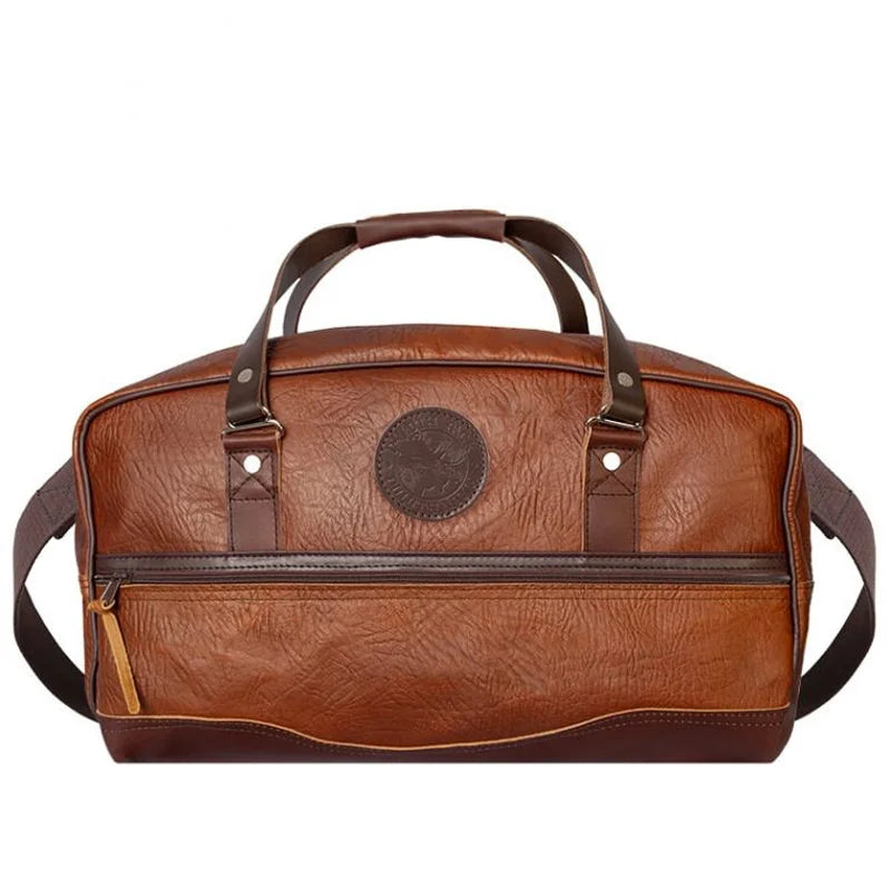 Duluth Pack Bison Leather Weekender Duffel in brown with white background