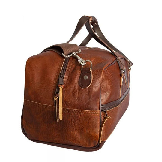 Duluth Pack Bison Leather Weekender Duffel on the side in black with white background