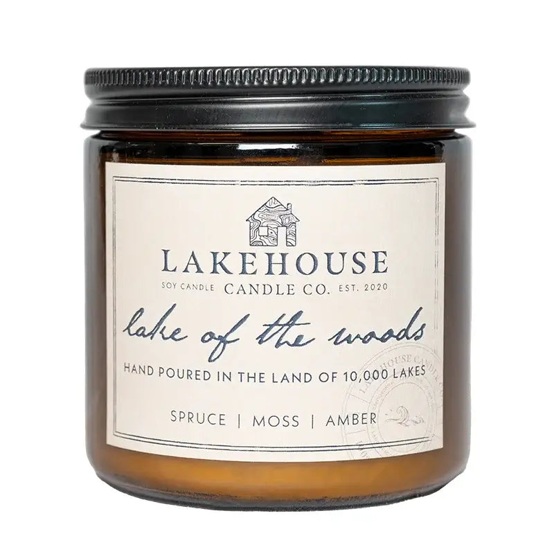 Lakehouse Candle Company Soy Candle in lake of the woods with spruce, moss, amber with a white background