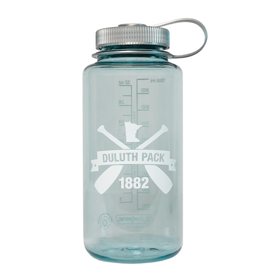 Seafoam Nalgene Water Bottle with cross canoe paddles Duluth Pack logo on it on a white background