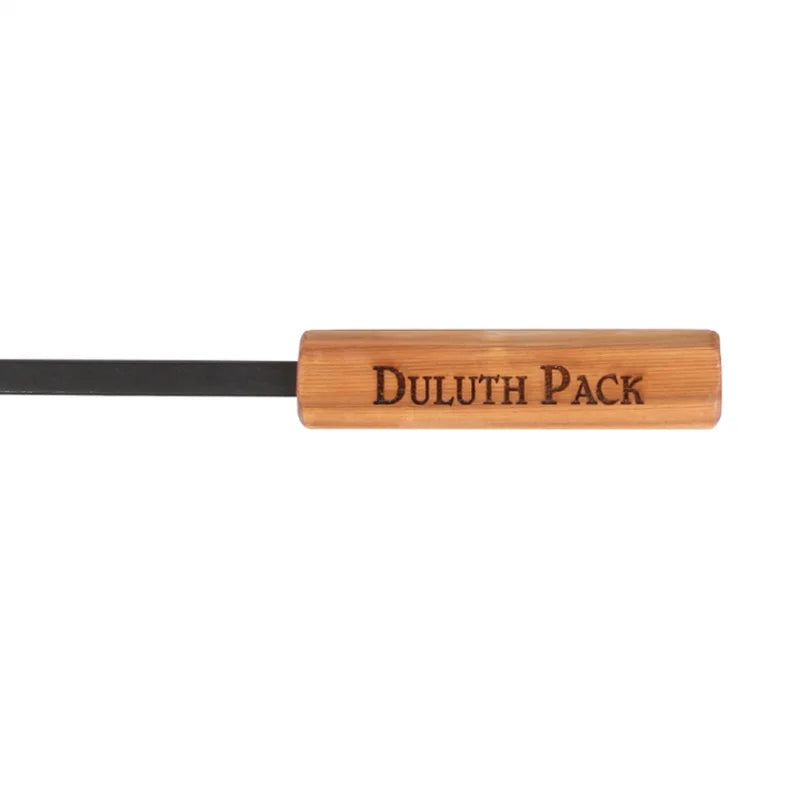 Duluth Pack Fire Poker close up with a white background