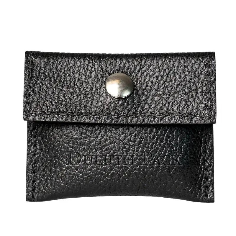 Duluth Pack Leather Hold-All Snap Wallet in Black Pebbled Leather with white background. 