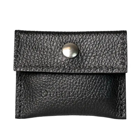 Duluth Pack Leather Hold-All Snap Wallet in Black Pebbled Leather with white background. 