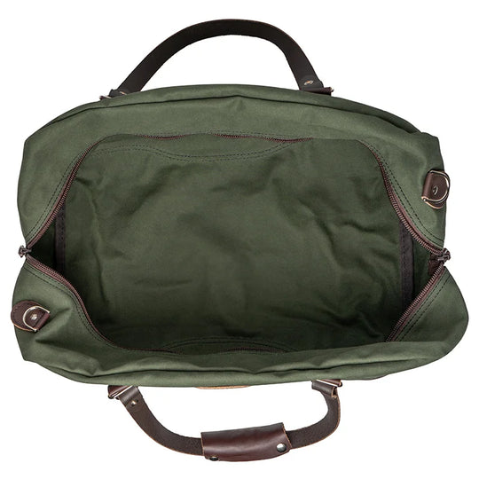 Weekender Duffel in Olive Drab by Duluth Pack, showcasing durable handcrafted canvas and leather interior ideal for rugged outdoor use and travel.