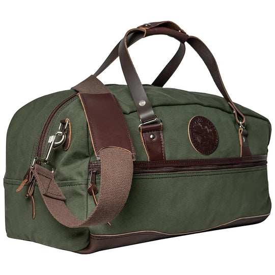 Weekender Duffel in Olive Drab with handcrafted leather bottom and rugged canvas by Duluth Pack, designed for durable outdoor travel and lasting performance.