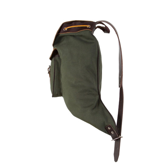 Rucksack Backpack in rugged waxed canvas with leather shoulder straps by Duluth Pack, designed for durable everyday use in outdoor and urban settings.
