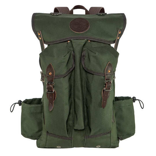 Outlander Pack in olive green canvas with leather straps, designed for rugged outdoor use and tight trail navigation by Duluth Pack.