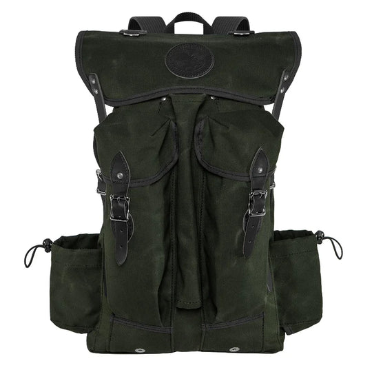 Outlander Pack in dark waxed canvas with leather accents, featuring a low profile design ideal for rugged outdoor bushcraft and dense trail use.
