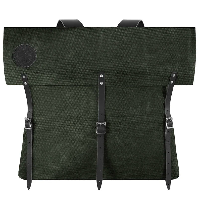 #3 Original Pack - 72 L in dark green waxed canvas with rugged leather straps, showcasing handcrafted durability and heritage outdoor design by Duluth Pack.