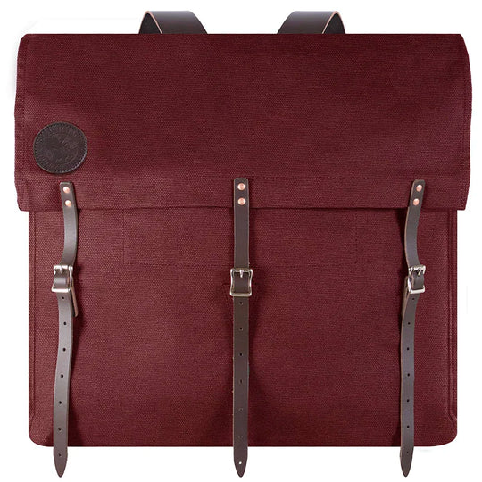 #4 Original Pack - 95 L in rich burgundy canvas with reinforced leather straps, designed for rugged outdoor use and reliable performance by Duluth Pack.