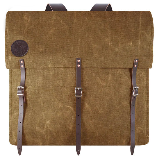 #4 Original Pack - 95 L in durable tan canvas with rugged leather straps, designed for outdoor hiking and canoeing adventures by Duluth Pack.