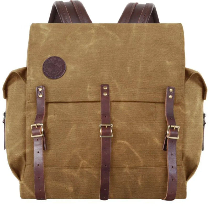 #3 Monarch Pack - 54 L in durable waxed canvas with leather straps, designed for rugged outdoor use and traditional canoe pack adventures.