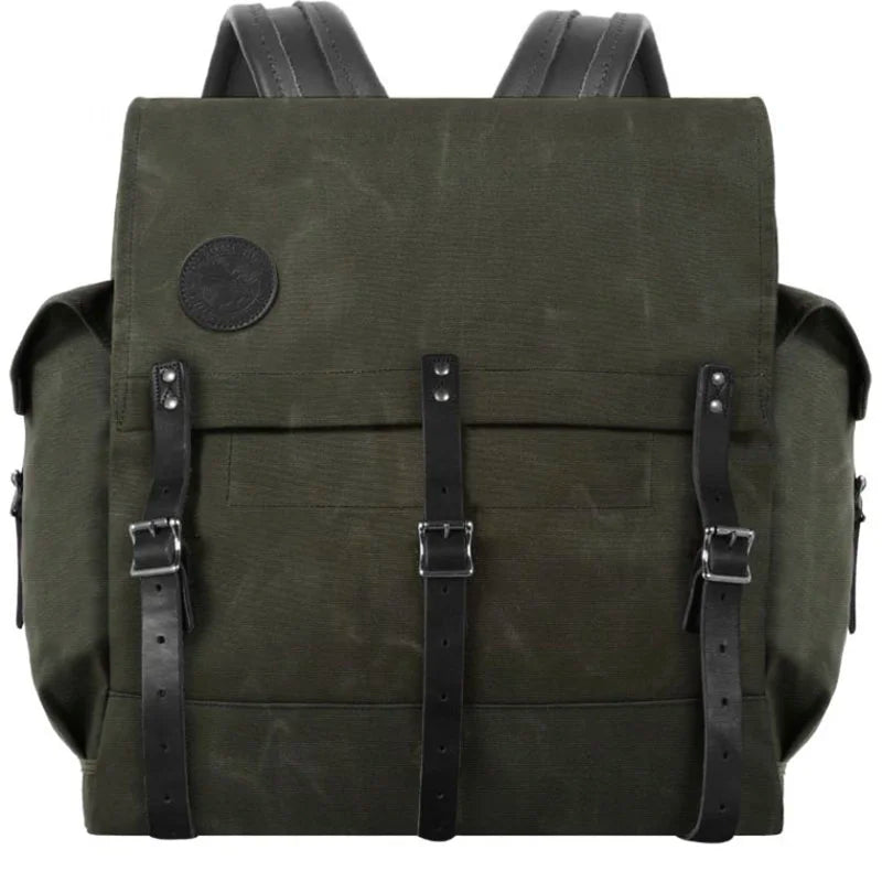 #3 Monarch Pack - 54 L in olive waxed canvas with leather straps, a durable traditional canoe pack designed for rugged outdoor use and long-lasting performance.