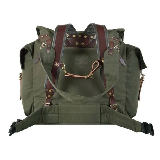 #3 Monarch Pack - 54 L in ultra burly green canvas with leather straps and a clip-on sternum strap, designed for rugged outdoor use and long-lasting performance