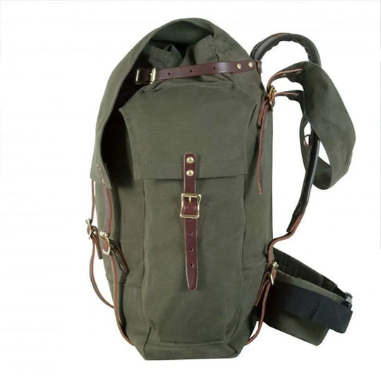 #3 Monarch Pack - 54 L in olive green canvas with leather straps, a traditional handmade canoe pack designed for durable outdoor use by Duluth Pack