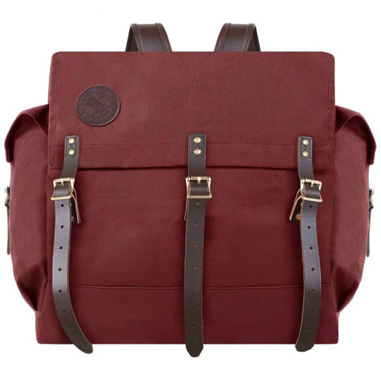 #4 Monarch Pack in burgundy 15-ounce canvas with leather straps, designed for durable outdoor use and traditional style from Duluth Pack heritage