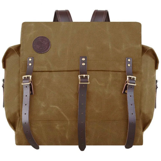 #4 Monarch Pack in burly 15-ounce canvas with leather straps, designed for rugged outdoor use and durable, traditional craftsmanship by Duluth Pack.