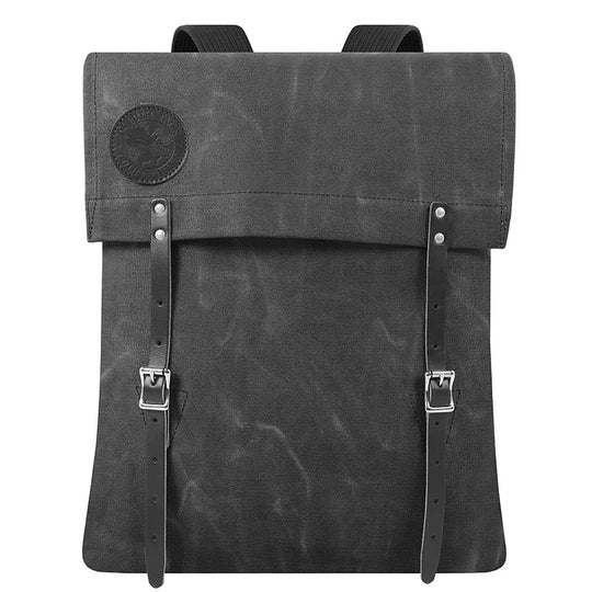 #51 Utility Pack in tough 15-ounce waxed canvas with premium leather straps, designed for durable outdoor use by Duluth Pack.