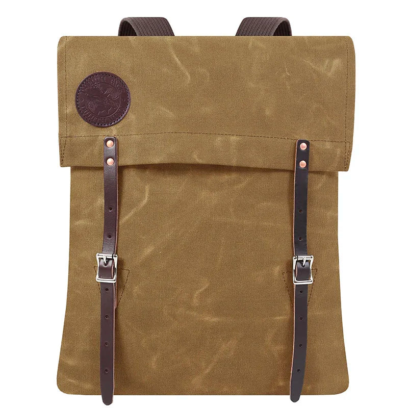 #51 Utility Pack in rugged waxed canvas with leather straps, designed for durable outdoor use and crafted by Duluth Pack with heritage quality.