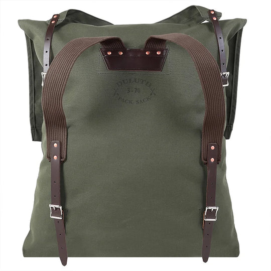 #3-70 Utility Pack - 60 L in rugged green canvas with leather straps and reinforced cotton shoulder straps, designed for durable outdoor use and hiking.