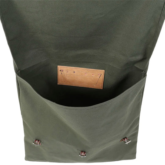#3-70 Utility Pack - 60 L in durable olive canvas with leather patch, featuring spacious interior ideal for outdoor use by Duluth Pack heritage craftsmanship.