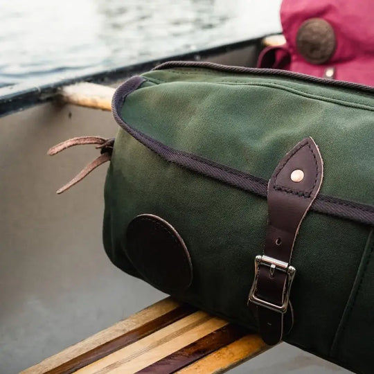 Canoe Thwart Bag Model II in olive drab with canoe in background