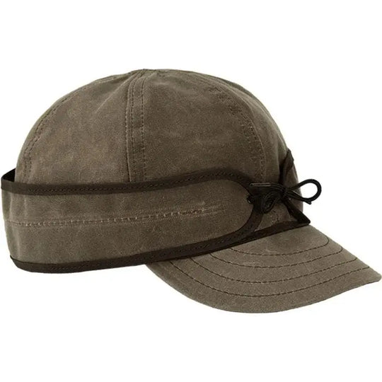 Stormy Kromer The Waxed Cotton Cap In Oak On A White Background