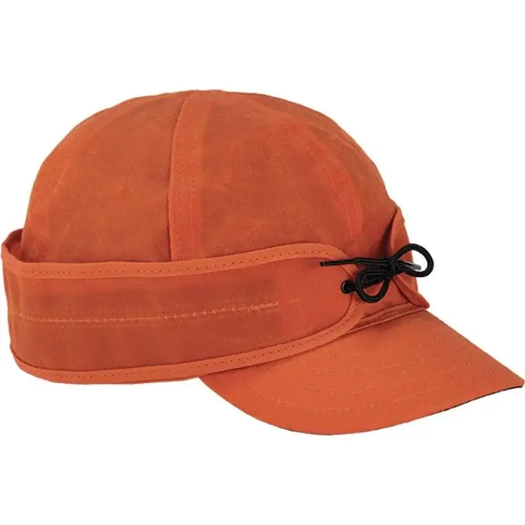 Stormy Kromer The Waxed Cotton Cap In Orange On A White Background