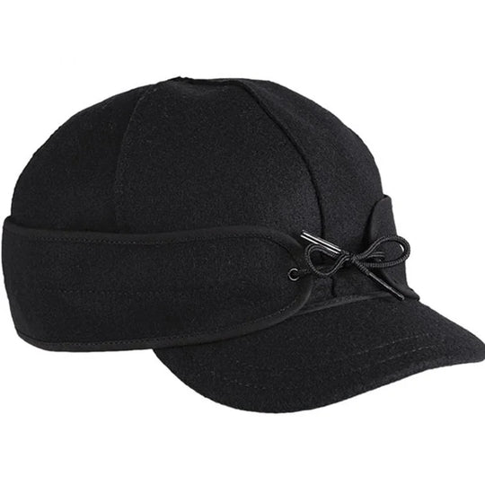 Stormy Kromer The Millie Kromer Cap in black with a white background
