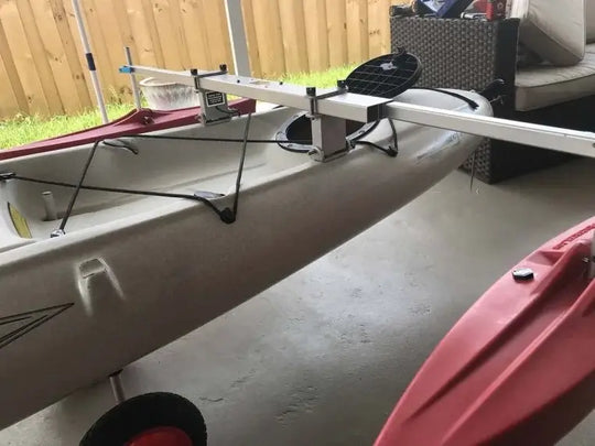 Spring Creek HD Kayak Stabilizer Floats Complete Package in Red mounted on a Kayak on land