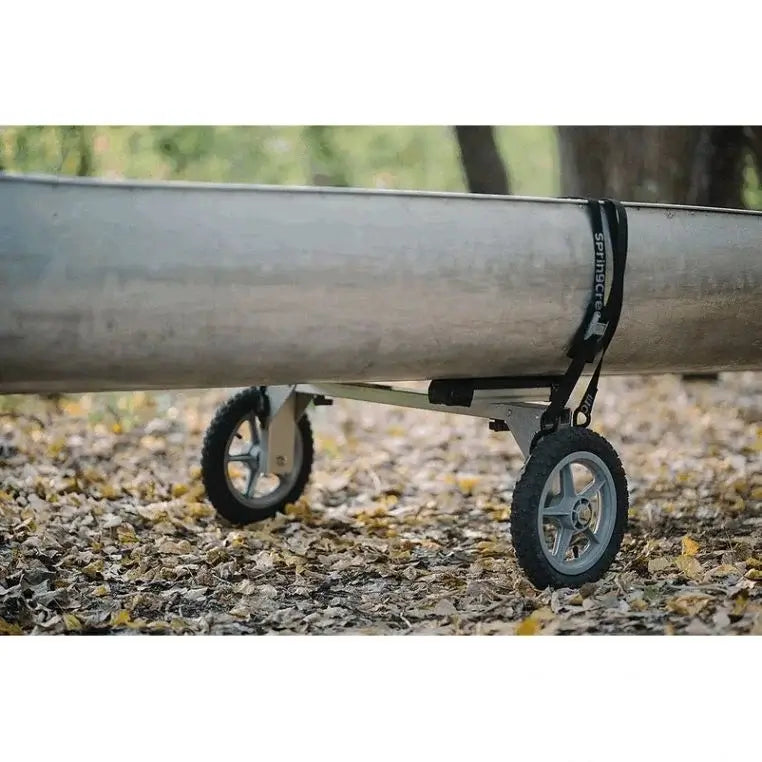 Spring Creek Canoe/Kayak Portage Cart On A Canoe in the Woods as seen from the side