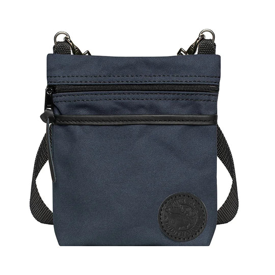 Signature Crossbody Purse in navy rugged 15-ounce canvas with adjustable strap, designed by Duluth Pack for durable everyday outdoor use.