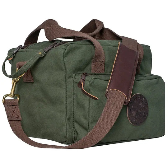 Range Bag In Olive Drab Green Canvas As Seen From The Side On A White Background Showcasing The Over The Shoulder Strap