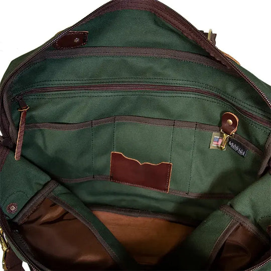 The Entrepreneur Briefcase In Olive Drab Green Showing Internal Zipper Pockets, Slip Pockets, Key Clip, &amp; Tags On A White Background