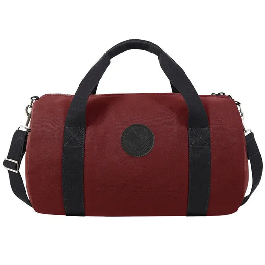 Round Duffel In Burgundy Red On A White Background
