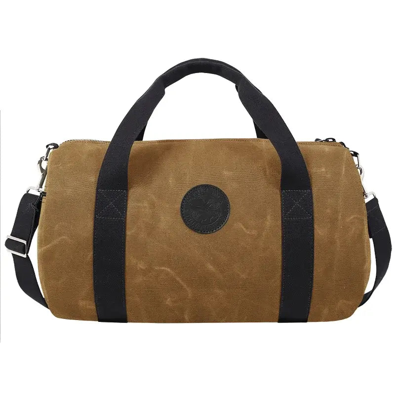 Round Duffel In Waxed Khaki On A White Background