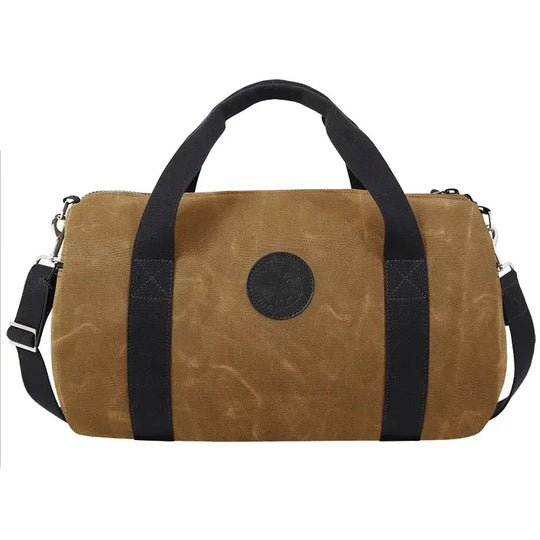 Round Duffel In Waxed Khaki On A White Background