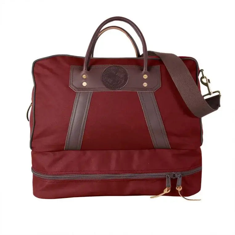 The Boot Duffel In Burgundy Red On A White Background