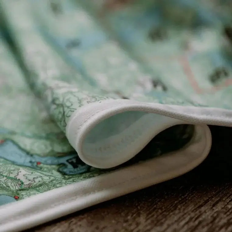 True North Map Co Cloth Multi Use BWCAW Maps Showing Cloth Texture With Fold
