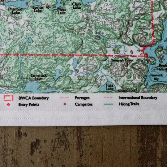 True North Map Co Cloth Multi Use BWCAW Maps On A Table